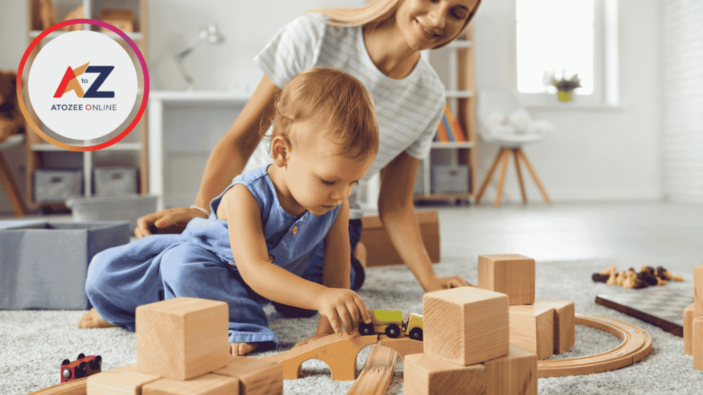 Teenage girl playing with a toddler while babysitting at home